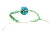 Pulsera medallón pequeño de flores naturales