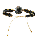 Pulsera medallón pequeño de flores naturales