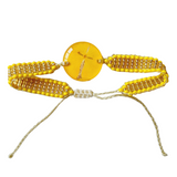 Pulsera medallón pequeño de flores naturales