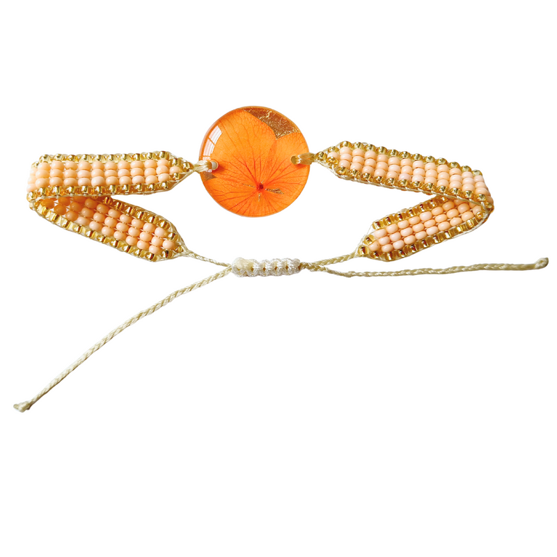 Pulsera medallón pequeño de flores naturales