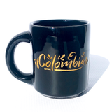 Mug Colombia con diseño dorado